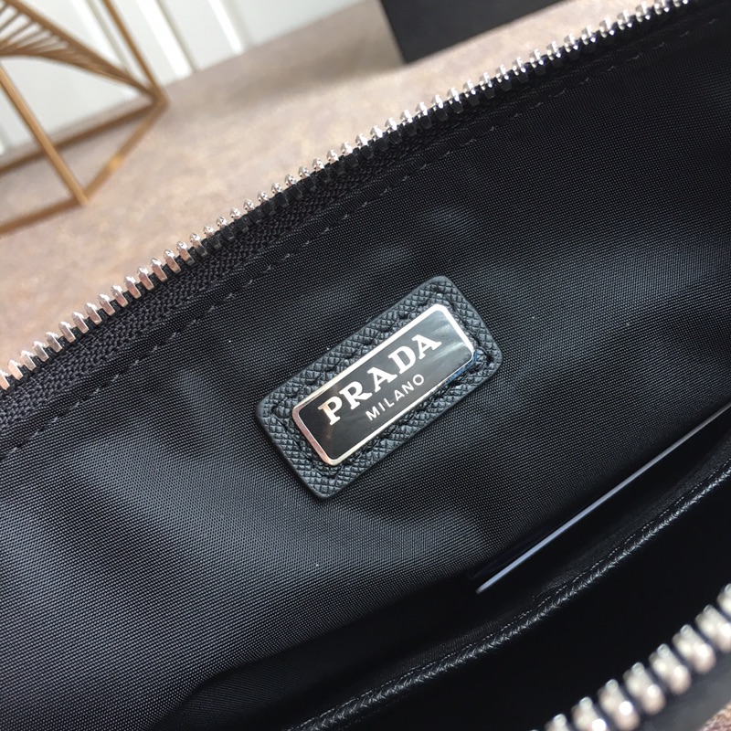 Pra*a clutch bags